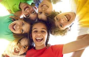 group of happy children playing together